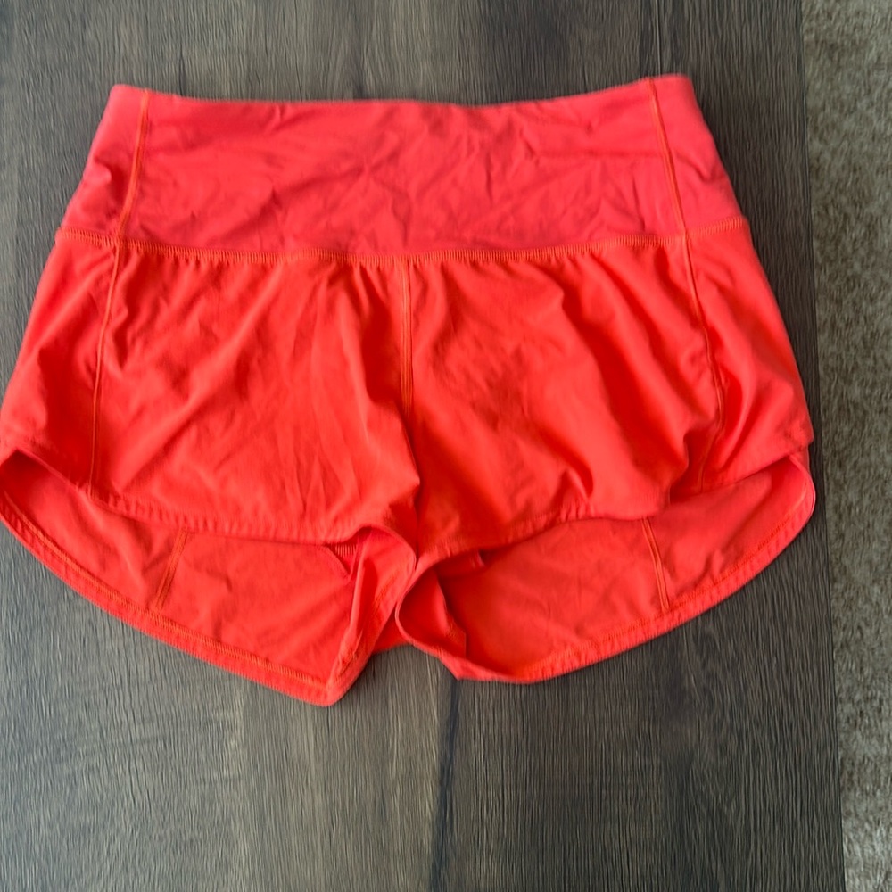 Lululemon Red speed up medium rise shorts in size US 4